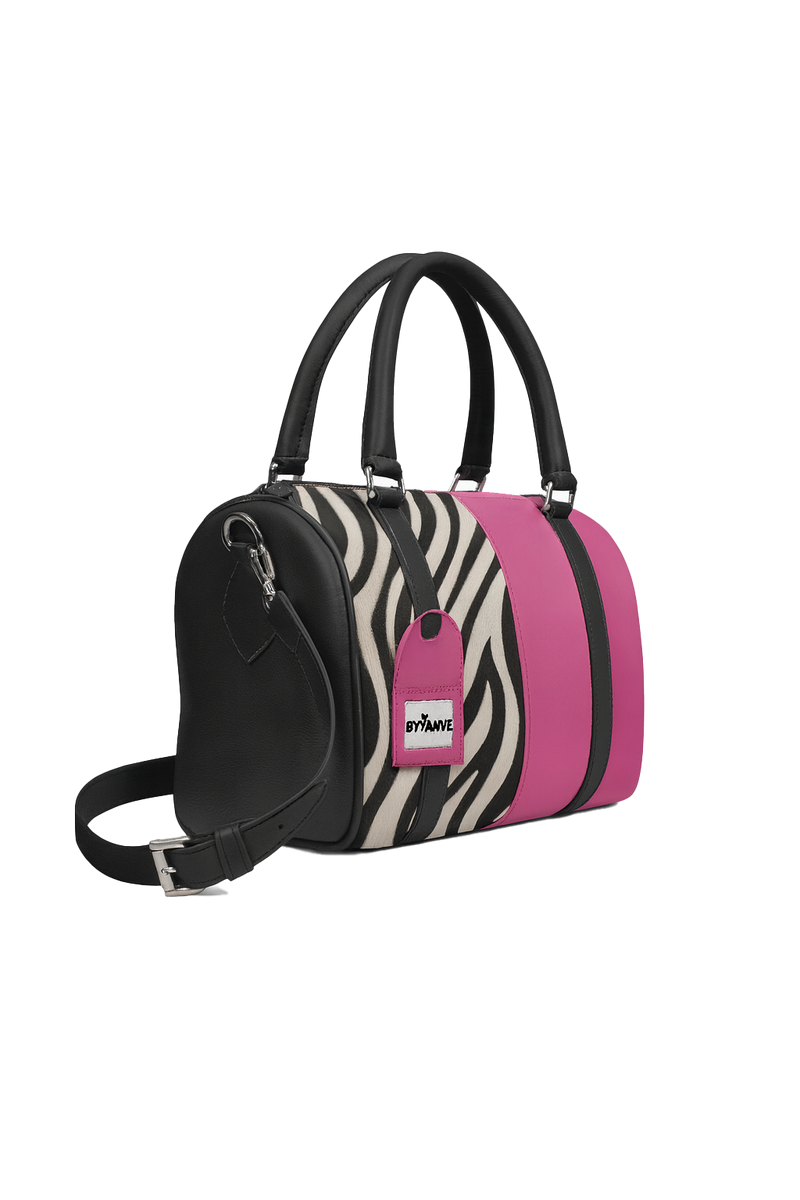 Tote with zebra print and pink accents on a white background