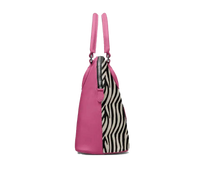 Pink tote bag with zebra pattern side panel on a white background
