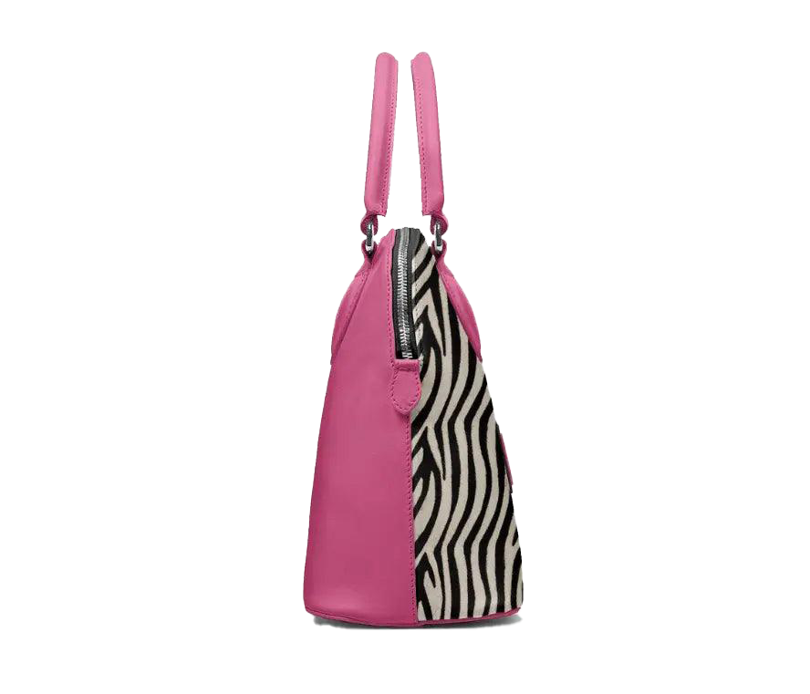 Pink tote bag with zebra pattern side panel on a white background