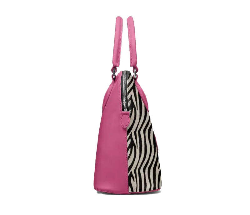 Pink tote bag with zebra pattern side panel on a white background