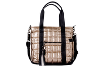 Gold puffer laptop tote with black straps and a black and white tassel