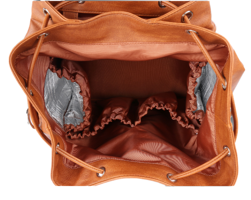 Brown vegan leather convertible backpack diaper tote with ruffled interior on a transparent background