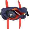 Navy duffel bag with red straps containing a denim shirt and a metal water bottle on a transparent background