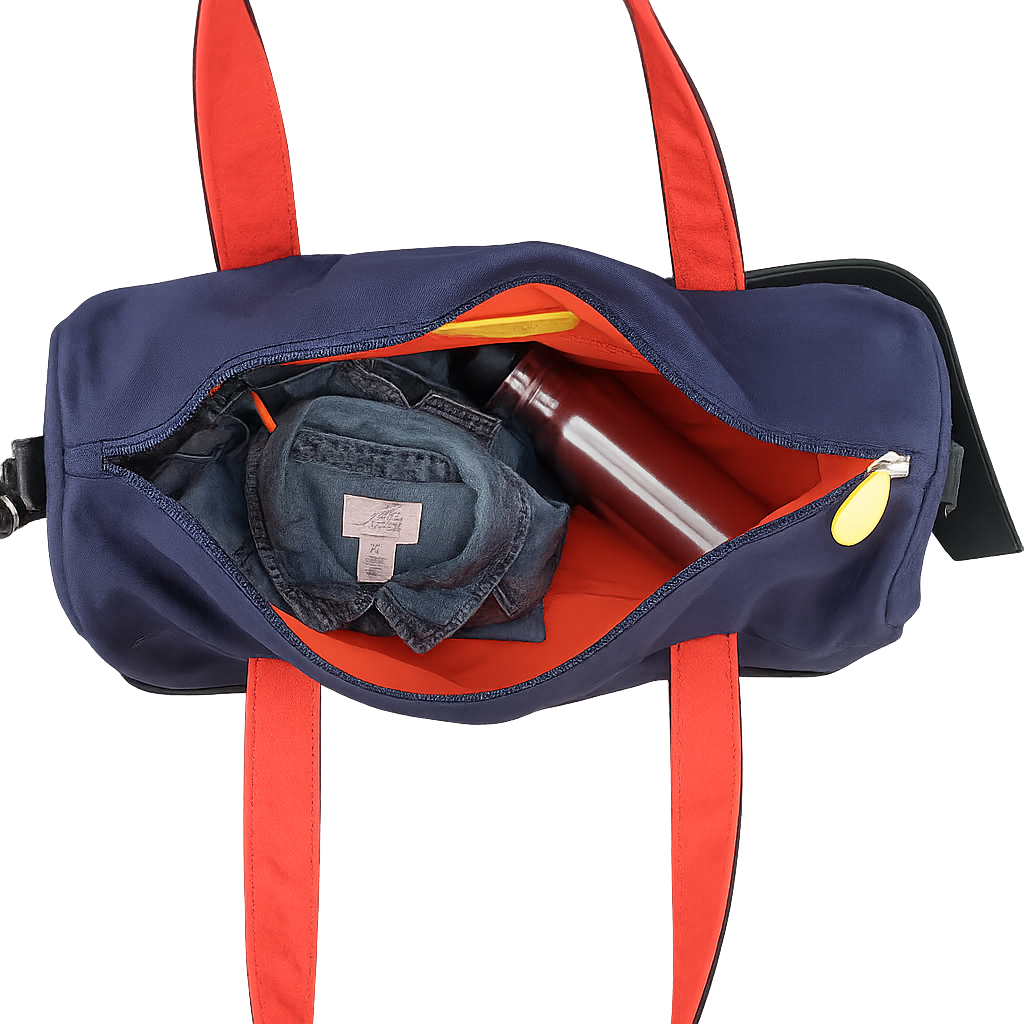 Navy duffel bag with red straps containing a denim shirt and a metal water bottle on a transparent background