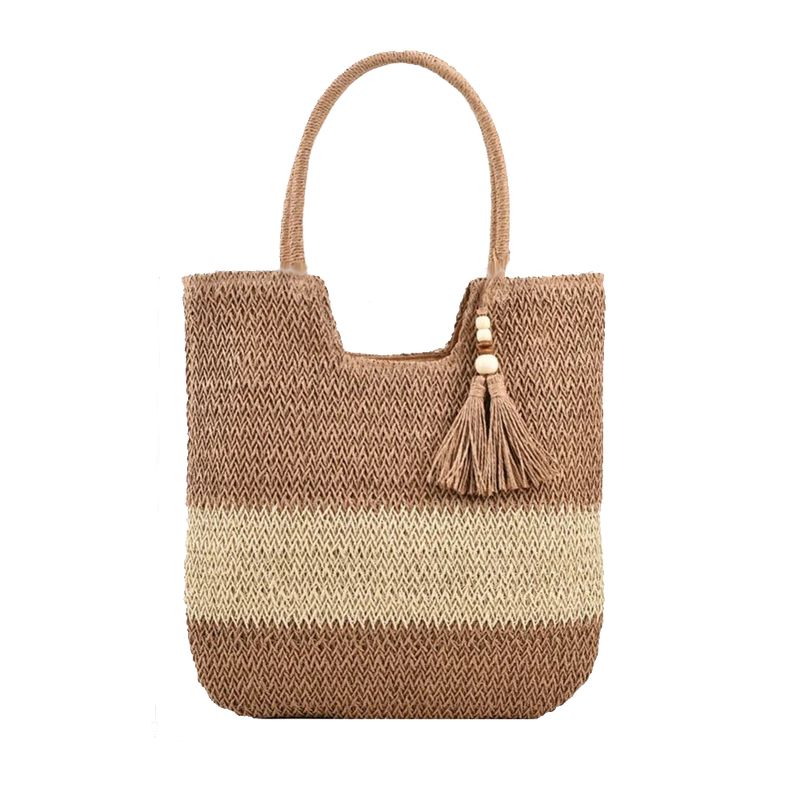 Woven handbag with a tassel on a white background