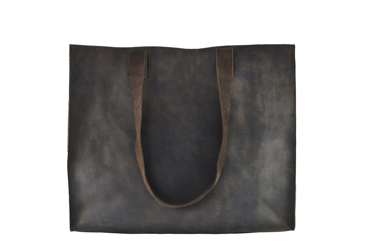 Dark brown leather tote bag on a white background