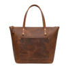 Brown leather tote bag with visible brand name on a white background
