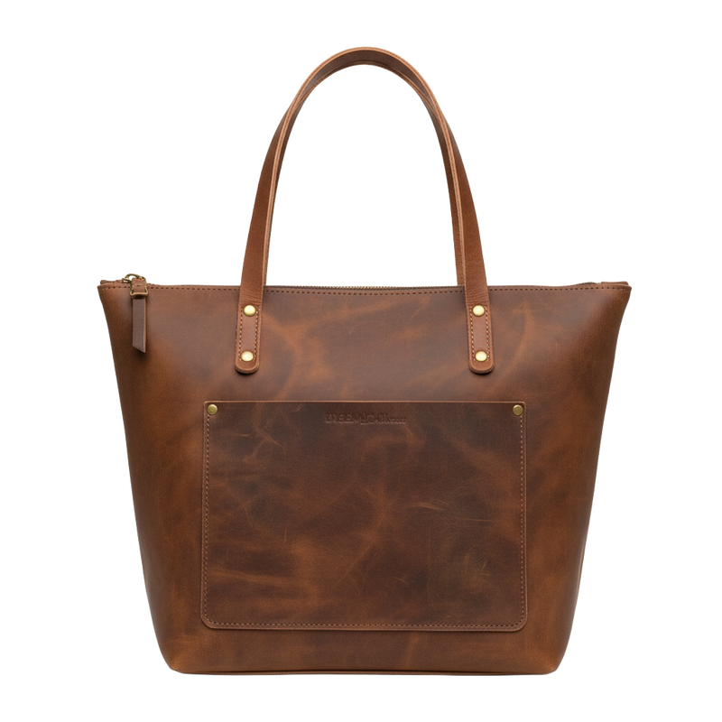 Brown leather tote bag with visible brand name on a white background