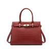 Burgundy croc tote with gold hardware on a white background