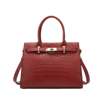 Burgundy croc tote with gold hardware on a white background