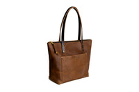 Mocha leather tote bag on a white background